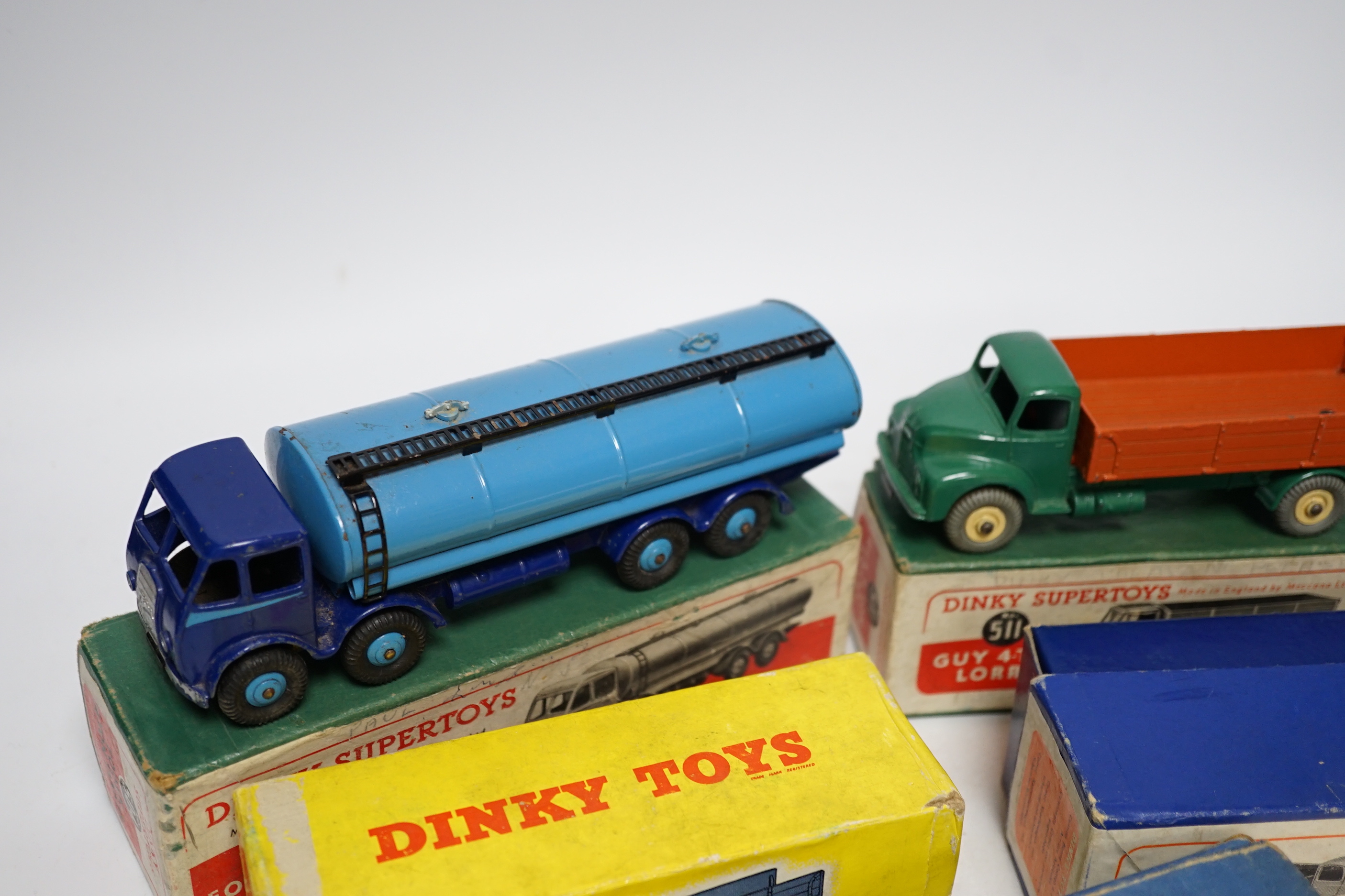 Three boxed Dinky Supertoys; (514) a Guy Slumberland Van, (504) a Foden 14 ton Tanker, and a (532) Comet Wagon with hinged tailboard, together with two useful empty boxes for a second Comet Wagon (418) and a Guy 4 ton Lo